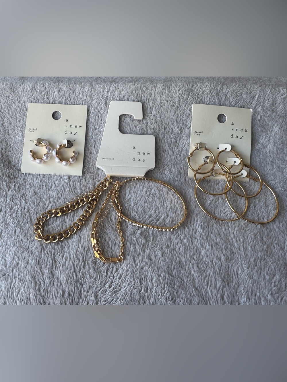 Lot of 7 A New Day Gold Toned Jewelry Bracelets and Earrings